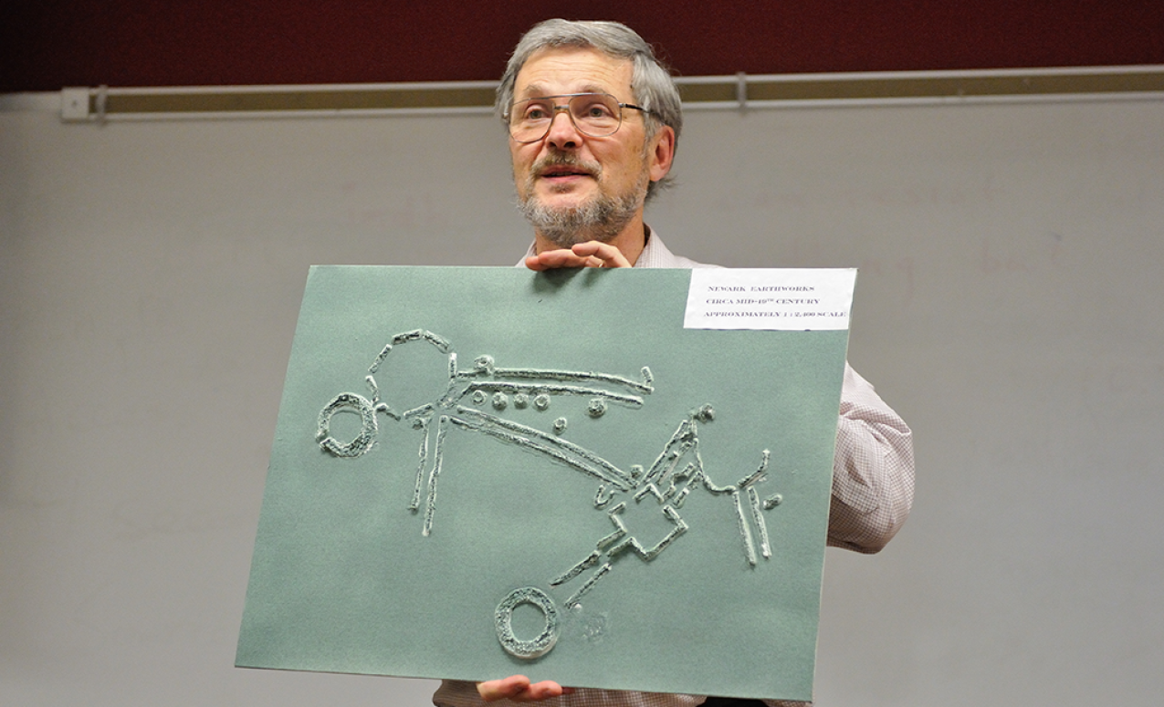 Reference and Special Collections Librarian John Crissinger holding up a raised map of the Newark Earthworks that is part of the Ohio Native Heritage Archives. Image courtesy of Timothy E. Black.