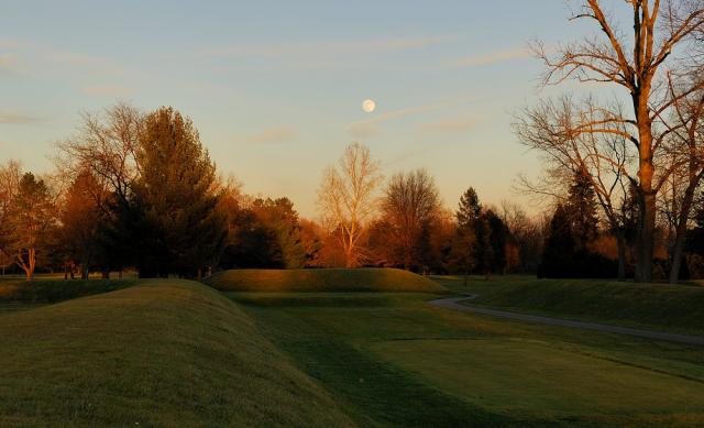 The moon above the Newark Earthworks' Octagon State Memorial with a lightening sky. Image courtesy of Timothy E. Black.