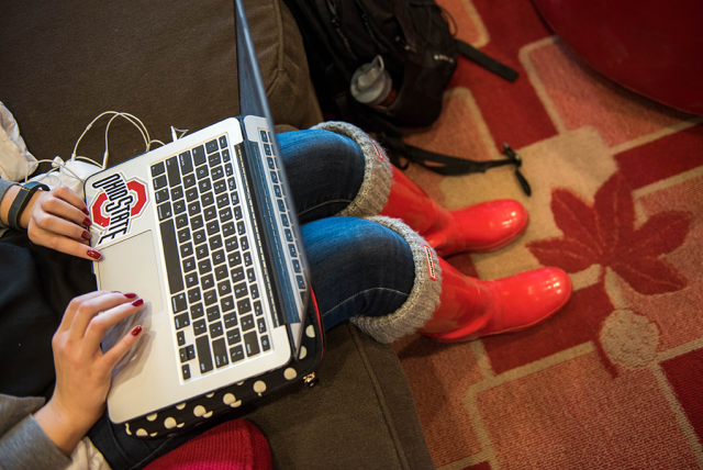 Overhead view of a student typing on their laptop at The Ohio State University. Image courtesy of The Ohio State University.