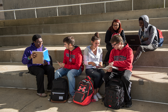 Students studying in a group on step at The Ohio State University. Image courtesy of The Ohio State University.