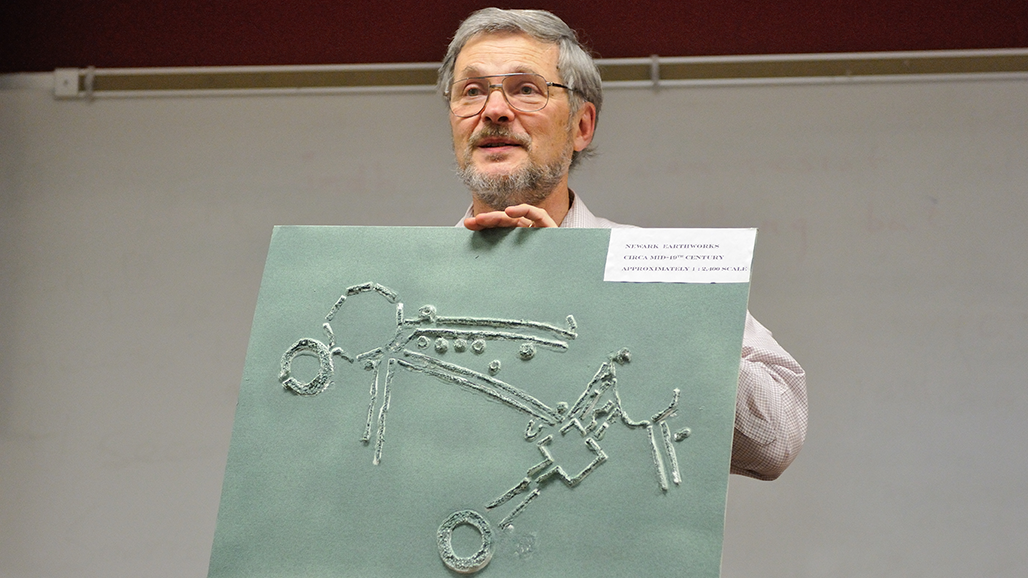 Reference and Special Collections Librarian John Crissinger holding up a raised map of the Newark Earthworks that is part of the Ohio Native Heritage Archives. Image courtesy of Timothy E. Black.