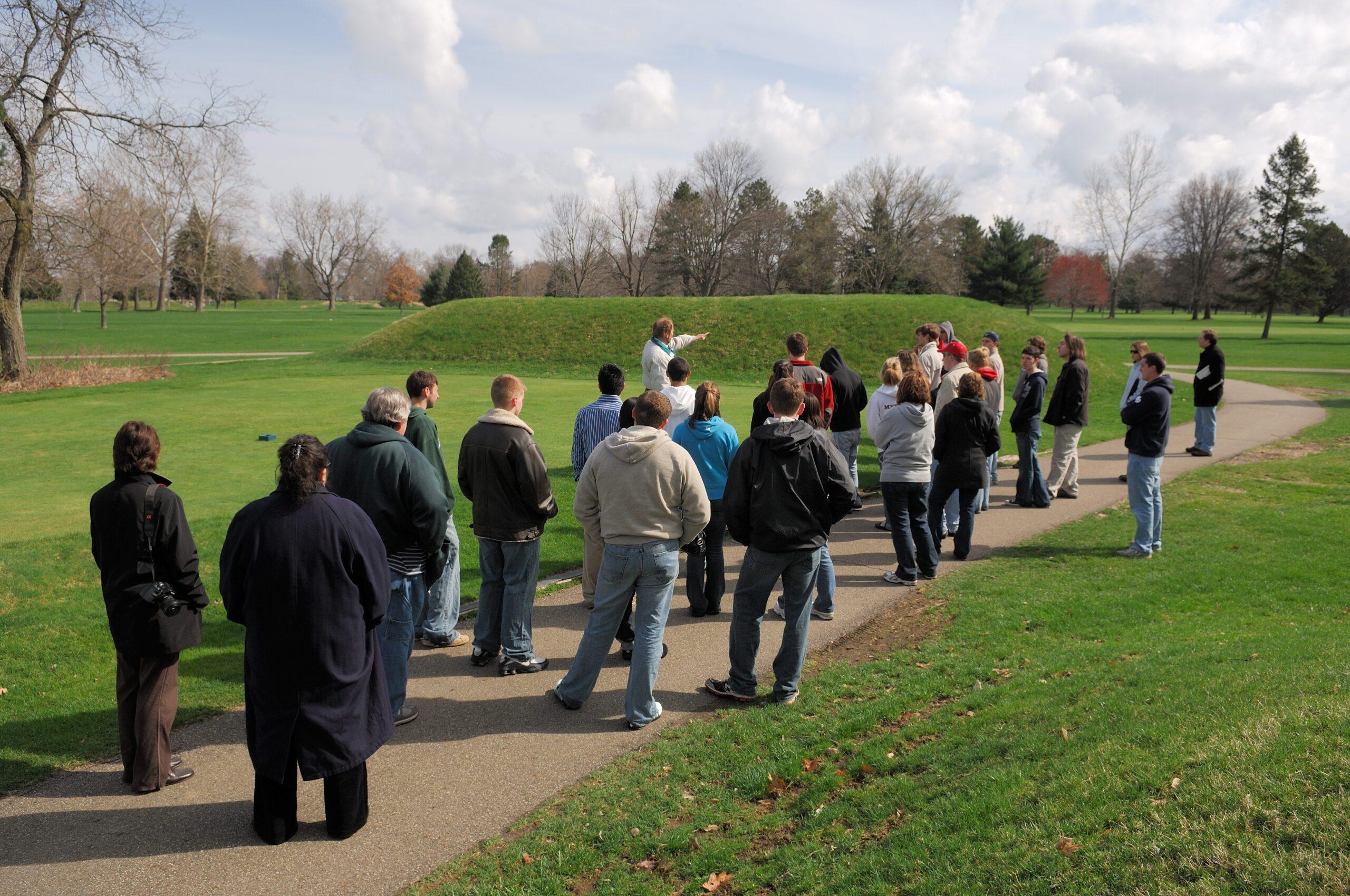 Tour group looking at mounds